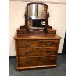 A Victorian mahogany six drawer dressing table