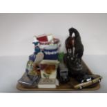 A tray of commemorative crowns, die cast vehicles, Royal Worcester figure,