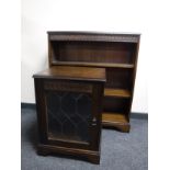 A reproduction oak audio cabinet together with matching bookshelves