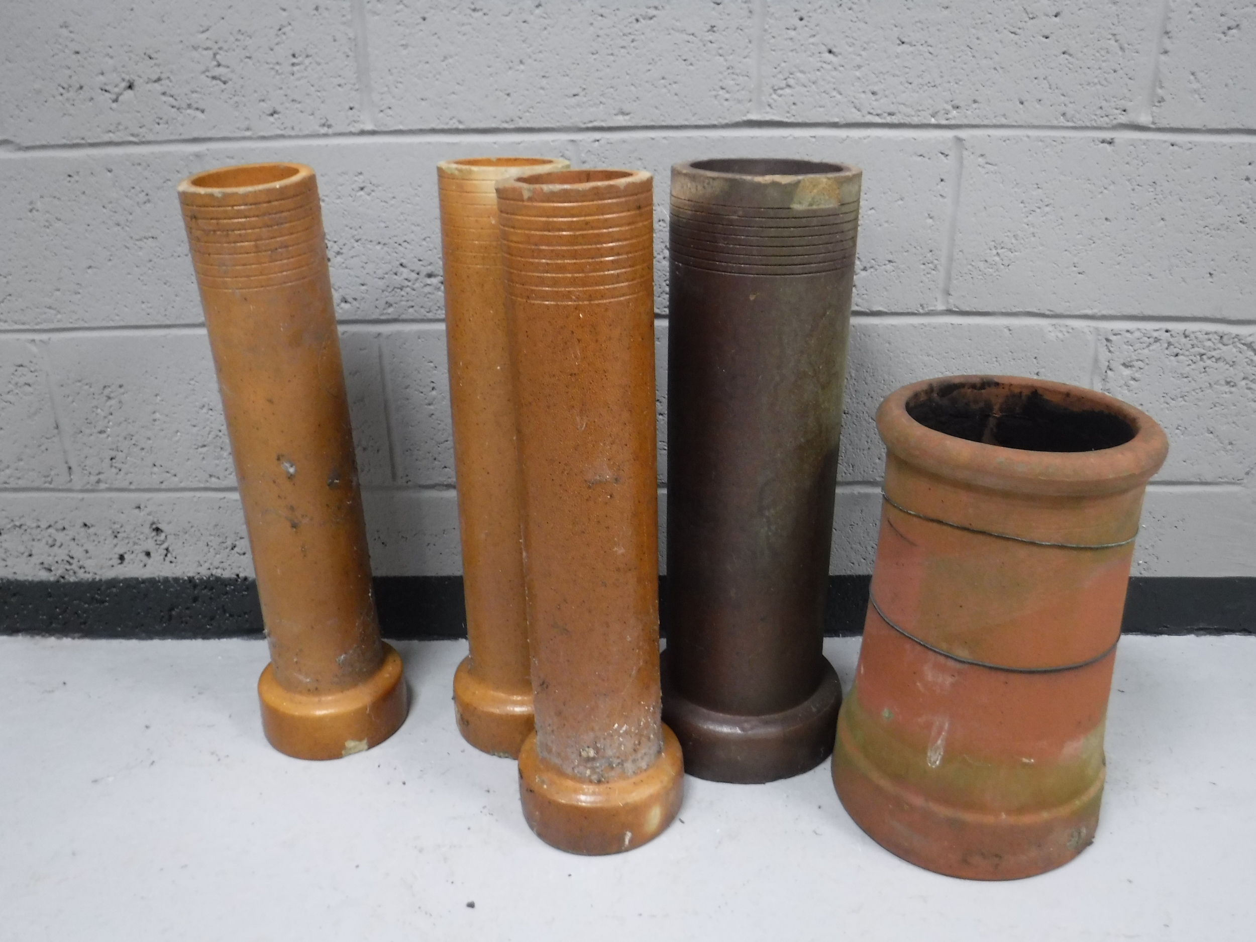 One chimney pot and four ground pipes