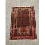 A Persian prayer rug