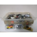 Two boxes of Atlas die cast vehicles and a magazines
