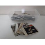 A box of antique postcards