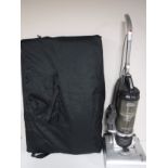 *Lot Withdrawn* A folding portable massage table in carry bag and a Hoover vac cleaner