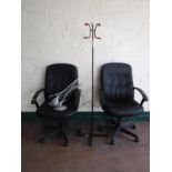 A pair of high backed swivel armchairs together with a 70's hat and coat stand and pair of