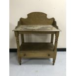 An antique pine washstand