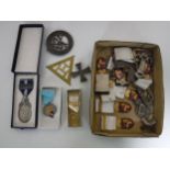 A box of Freemasons medals and badges