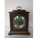 A Seth Thomas brass faced mantel clock