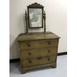 An antique pine dressing chest