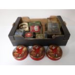 A box containing vintage tins