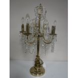 A brass five way decorative table lamp with glass drops