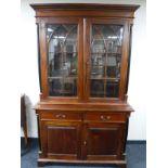 A reproduction Victorian style bookcase