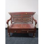 A Chinese style low bench fitted with two drawers