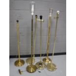 Six brass standard lamps