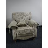 A contemporary armchair upholstered in floral print