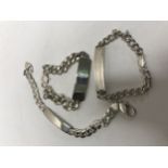 Three silver identity bracelets,