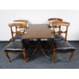 A Regency style drop leaf pedestal dining table,