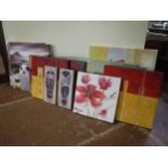 Twelve assorted wall canvases