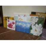 Twelve assorted wall canvases