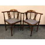 A pair of late Victorian inlaid mahogany corner chairs
