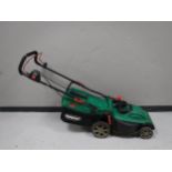 A Qualcast electric lawn mower with lead