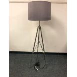A contemporary rise and fall floor lamp