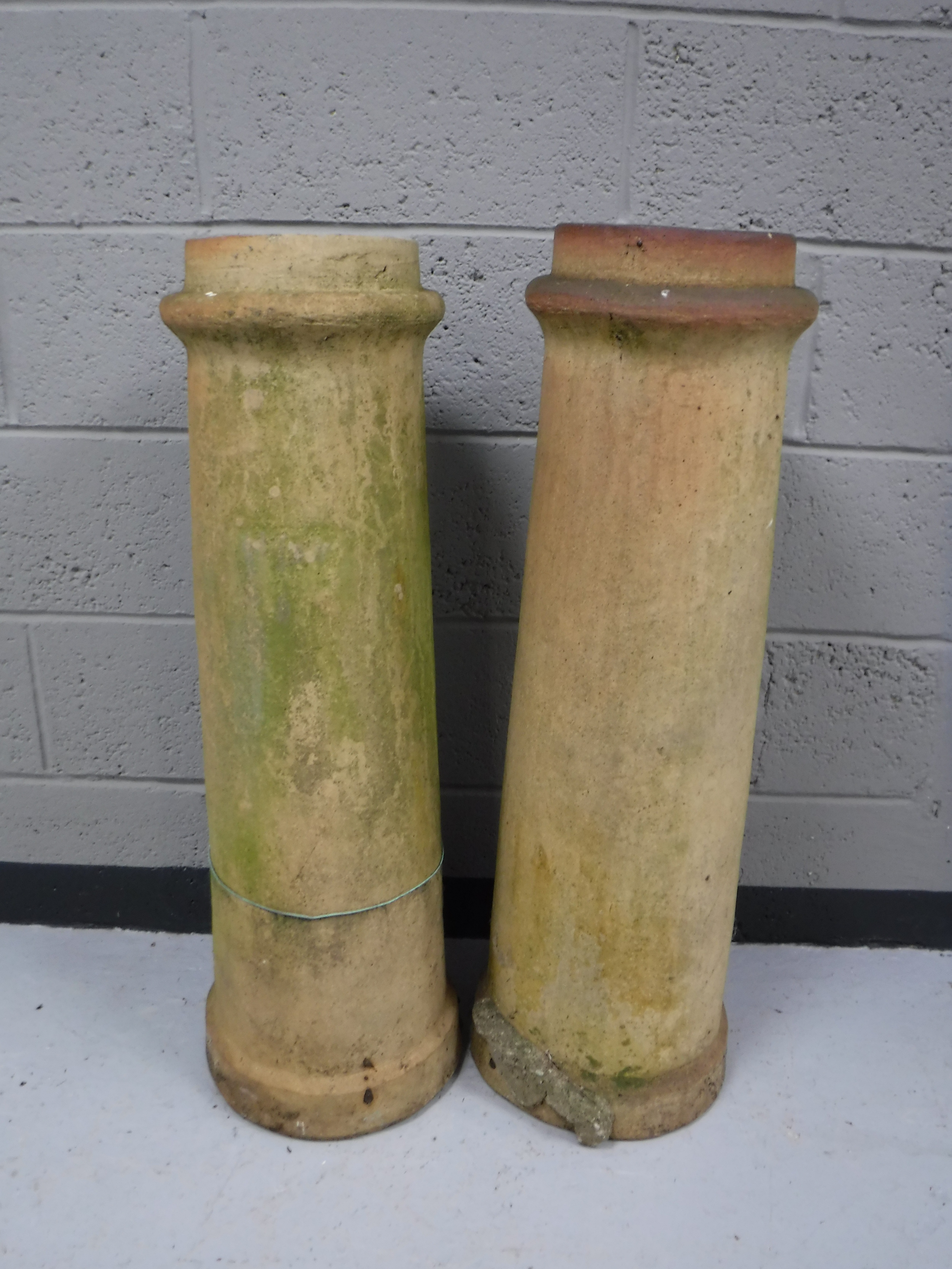 A pair of early twentieth century chimney pots