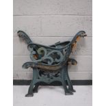 A pair of cast iron bench ends