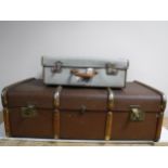 A vintage luggage case together with an early twentieth century wooden bound travelling trunk