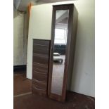 A mirrored storage cabinet together with matching six drawer chest