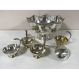 A silver plated punch bowl with ladle and cups CONDITION REPORT: Bowl 31cm in