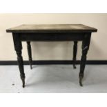 An antique pine kitchen work table fitted with a drawer