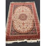 A Keshan rug,