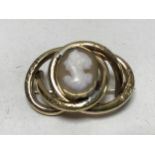 An antique pinchbeck cameo brooch