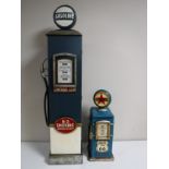 Two storage cabinets in the form of American gas pumps