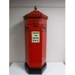 A wine cabinet in the form of British postbox