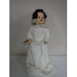 A mid 20th century doll