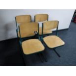 A set of four mid twentieth century metal framed beech chairs