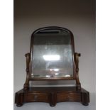 A Victorian mahogany dressing table mirror fitted with two drawers