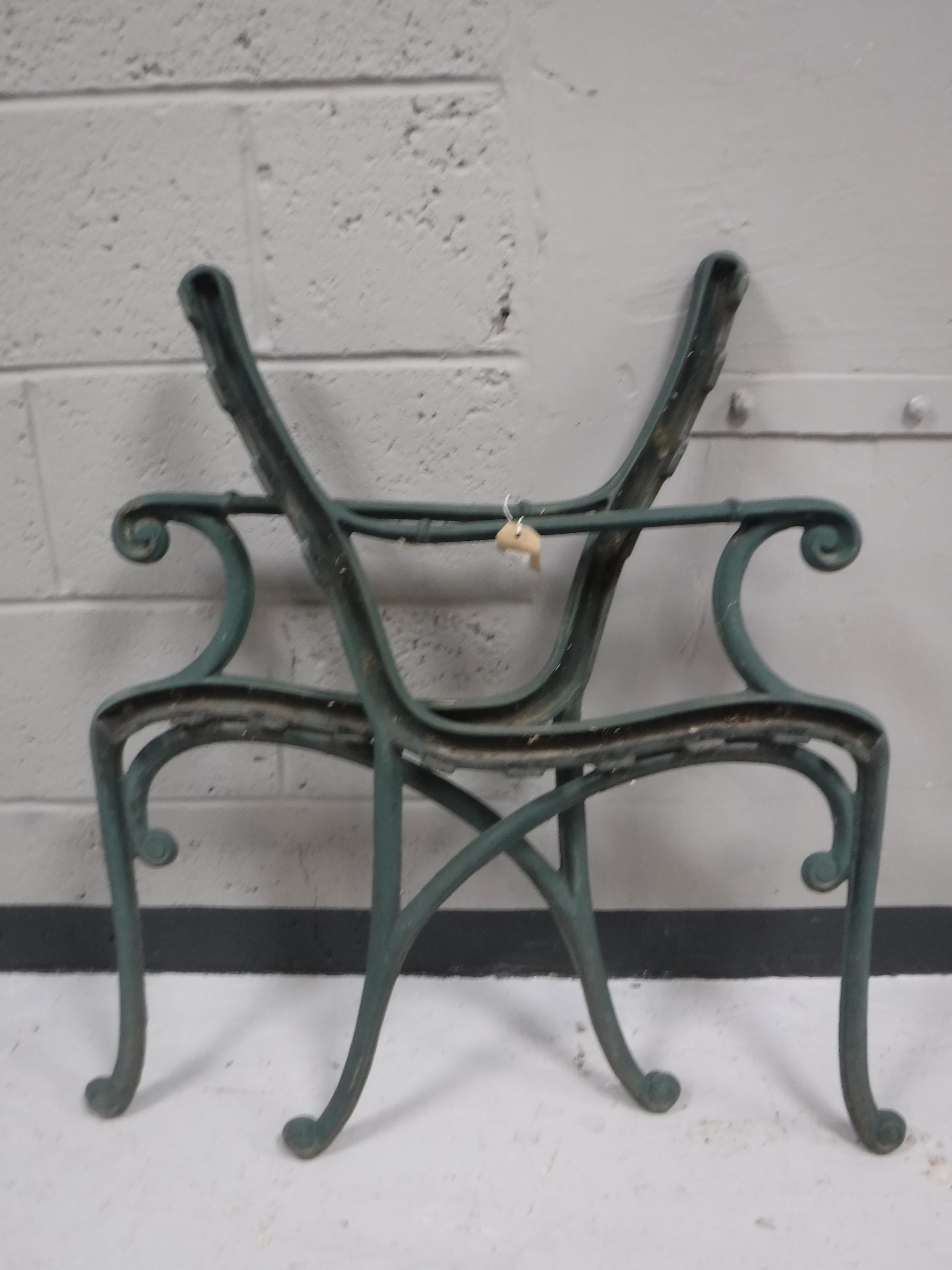 A pair of cast iron bench ends