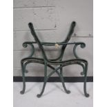 A pair of cast iron bench ends