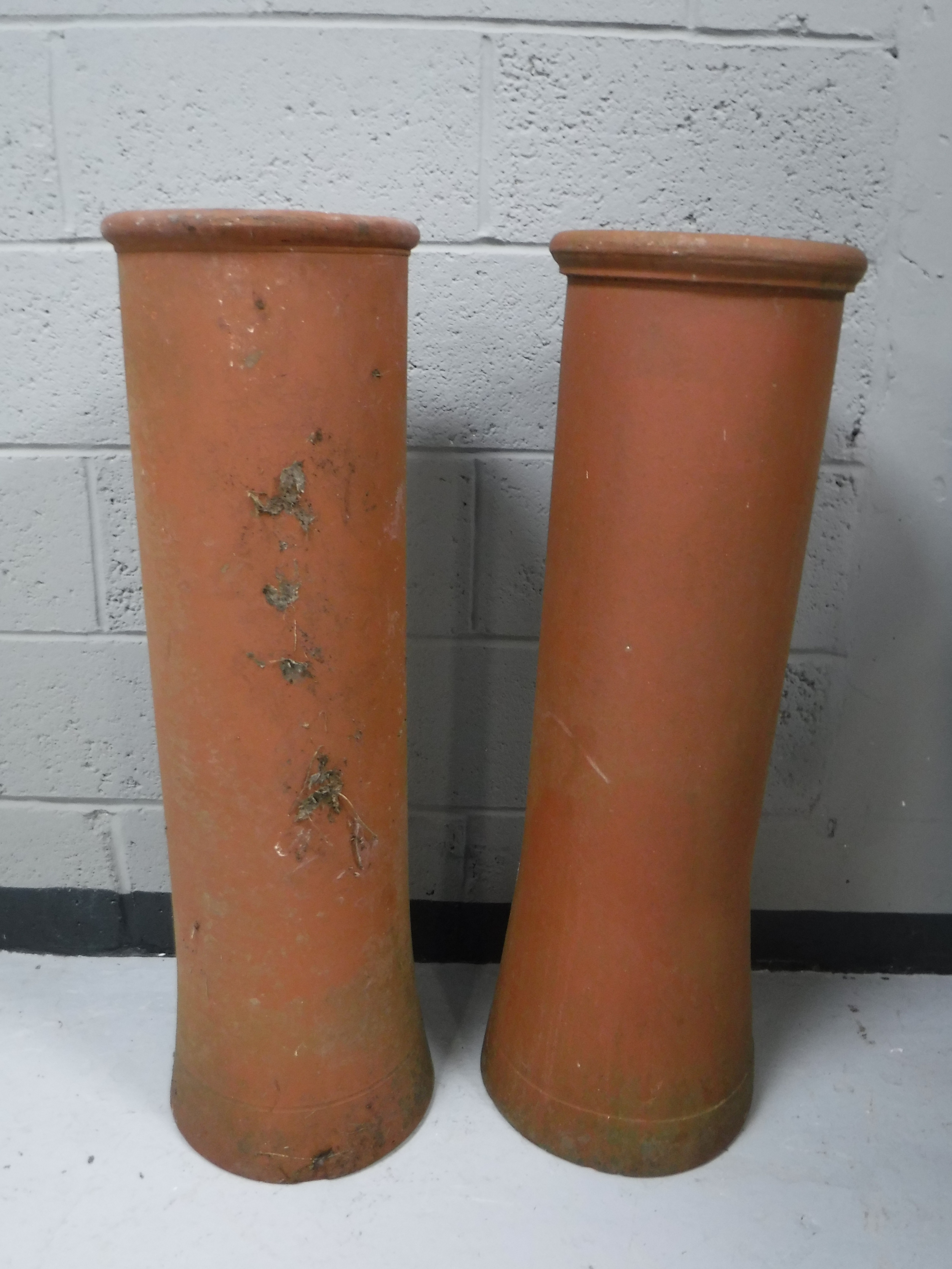 A pair of twentieth century chimney pots