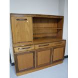 A late twentieth century teak G-plan sideboard