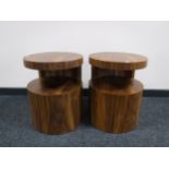 A pair of Art Deco style walnut effect cylindrical bedside stands
