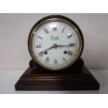 An early twentieth century mahogany cased mantel clock,