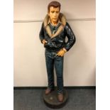 A life-size floor standing model of James Dean