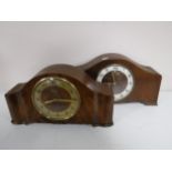 Two early 20th century walnut mantel clocks.