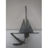 A galvanized Danforth style anchor and one other.
