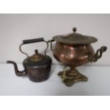 A copper and brass samovar and an antique copper kettle