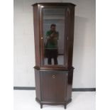 A mahogany Stag minstrel corner cabinet